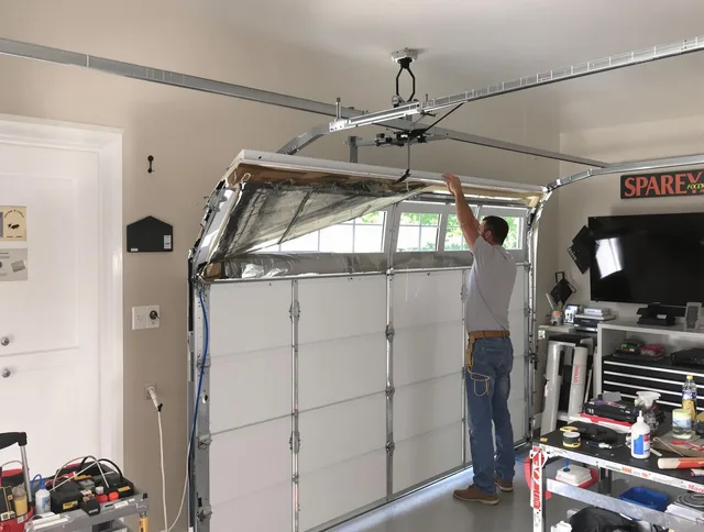 Garage door section replacement by Somers Garage Door Repair in Somers