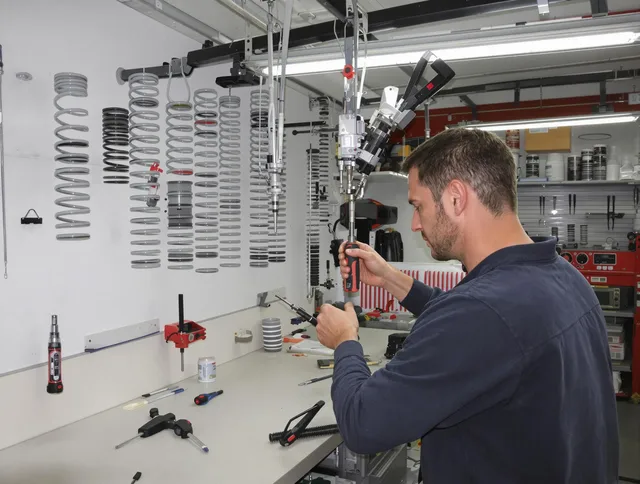 Somers Garage Door Repair safety certified technician performing precision spring replacement in Somers