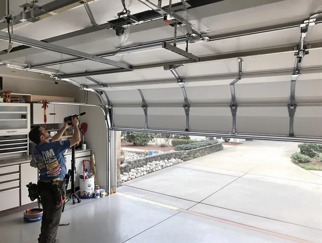 Garage door track repair service by Somers Garage Door Repair in Somers